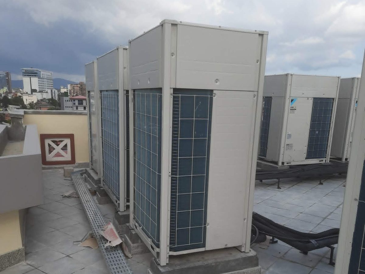 Condensers on plinths with cable tray